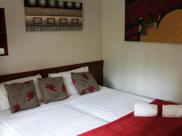 Bohemia Resort Cairns : photo 5 de la chambre suite queen coloniale