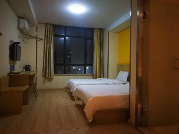 7Days Inn Hangzhou Xiaoshan People`s Square Metro Station : photo 7 de la chambre chambre lits jumeaux confortable