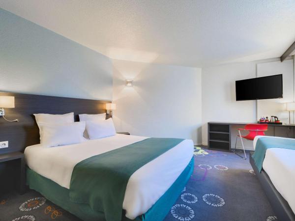 Kyriad Lille Gare - Grand Palais : photo 1 de la chambre chambre 1 lit double et 3 lits simples