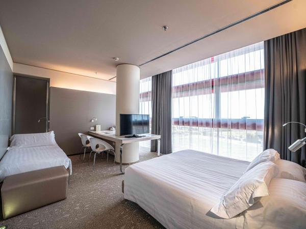 Best Western Plus Net Tower Hotel Padova : photo 2 de la chambre chambre lit queen-size confort avec lit d'appoint simple
