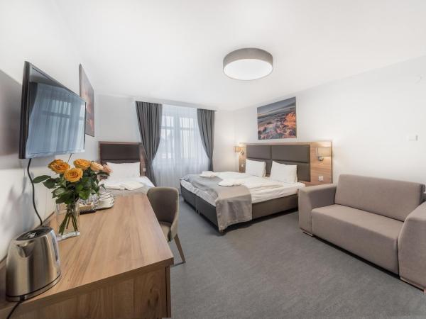 Harmony House : photo 4 de la chambre chambre quadruple avec salle de bains privative