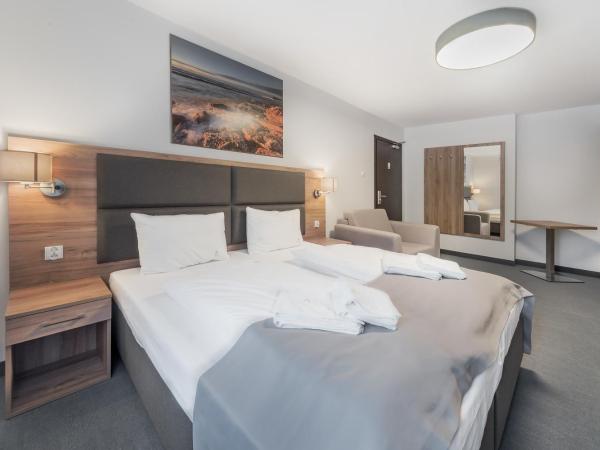 Harmony House : photo 5 de la chambre chambre quadruple avec salle de bains privative