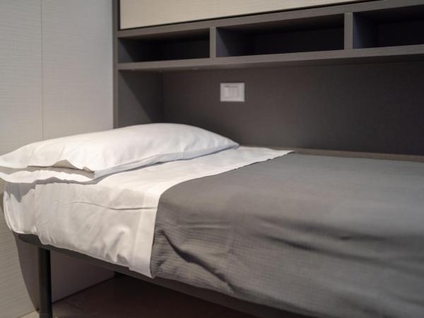 LUOGO COMUNE Ostello : photo 6 de la chambre dortoir mixte de 6 lits