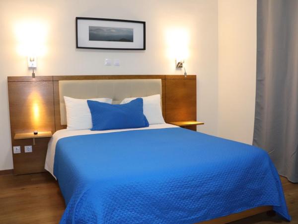 Hotel Belém Tejo - Setubalense : photo 1 de la chambre chambre familiale