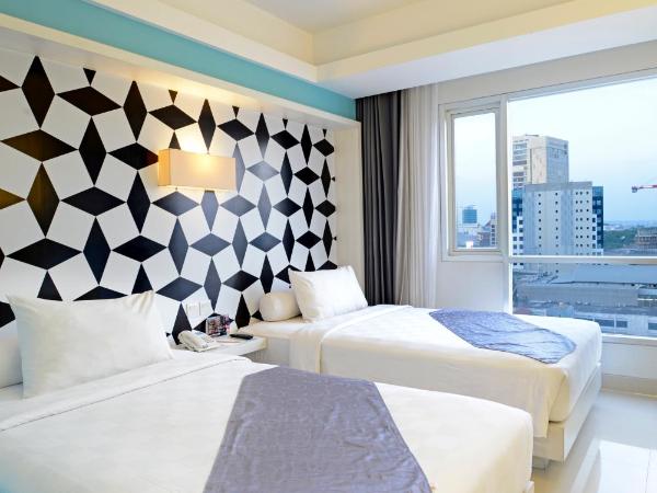 CROWN PRINCE Hotel Surabaya Managed by Midtown Indonesia : photo 1 de la chambre chambre lits jumeaux cozy