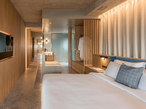 Urban Suites : photo 4 de la chambre suite lit king-size - vue sur mer