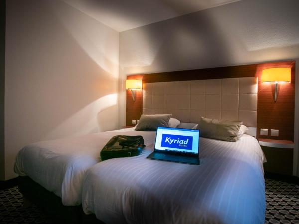 Kyriad Limoges Centre Gare - Atrium : photo 6 de la chambre chambre lits jumeaux standard