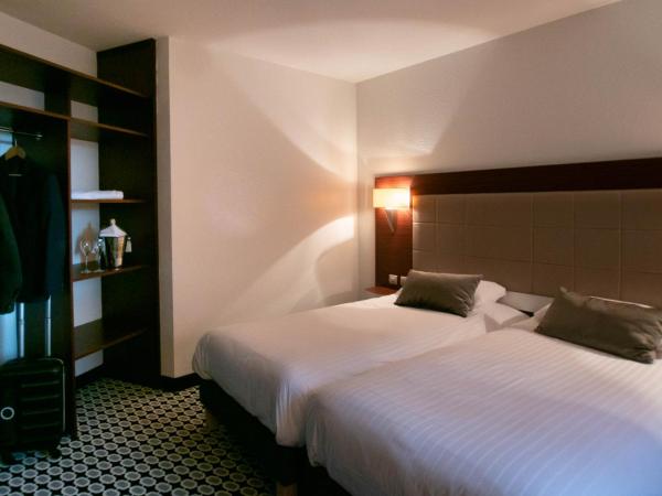 Kyriad Limoges Centre Gare - Atrium : photo 4 de la chambre chambre lits jumeaux standard