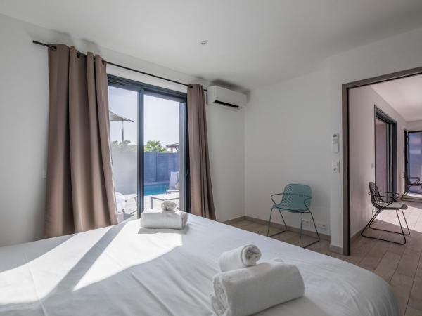 Résidence Pierre & Vacances Premium Vesna Rossa : photo 2 de la chambre maison 3 chambres avec climatisation, piscine privée de 7 mètres et jardin (6 adultes)