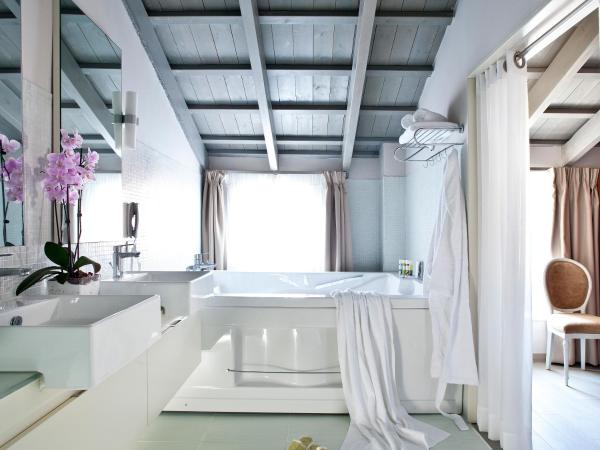 Rimondi Boutique Hotel - Small Luxury Hotels of the World : photo 7 de la chambre suite luxueuse - domaine