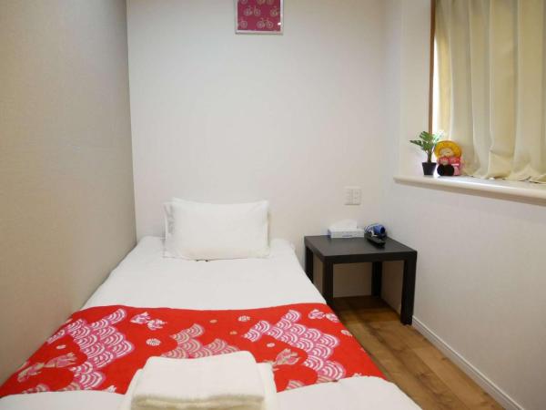 Tokyo shinjukutei Hotel Asahi gruop 東京新宿亭ホテル : photo 1 de la chambre chambre simple avec salle de bains privative