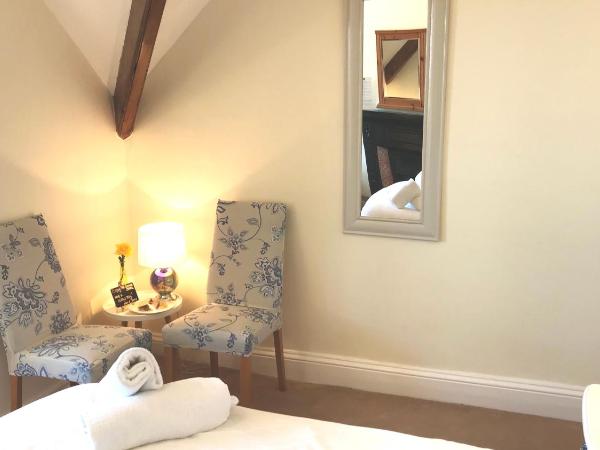 St. Raphael Guest House : photo 2 de la chambre chambre triple (3 personnes)