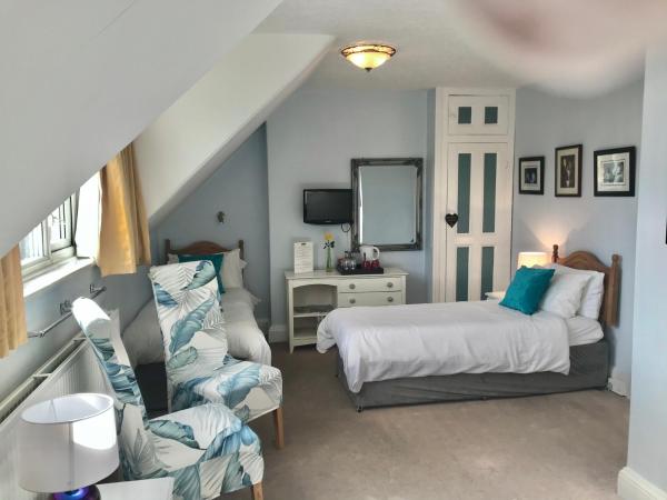 St. Raphael Guest House : photo 2 de la chambre chambre quadruple (4 personnes)