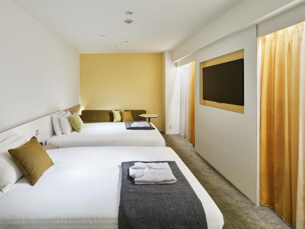 Tenza Hotel & SKYSPA at Sapporo Central : photo 1 de la chambre chambre lits jumeaux standard - fumeurs