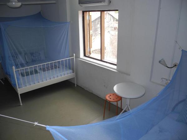 Voyage Home&Guesthouse : photo 7 de la chambre chambre quadruple Économique avec salle de bains commune