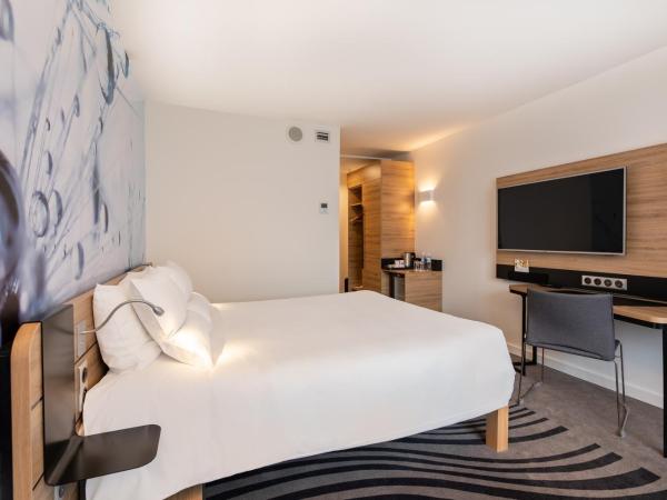 Novotel Wrocław City : photo 1 de la chambre chambre double supérieure avec canapé