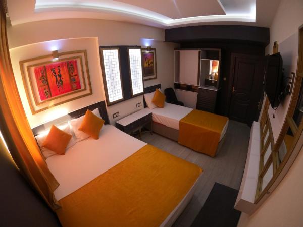 Exporoyal Hotel : photo 3 de la chambre chambre triple standard