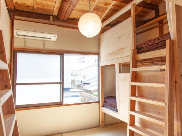 Fukuoka Guesthouse SHIP : photo 2 de la chambre lit simple dans dortoir pour femmes