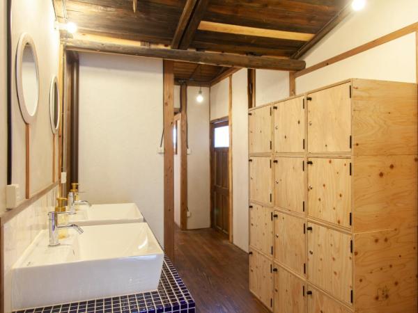 Fukuoka Guesthouse SHIP : photo 8 de la chambre lit simple dans dortoir mixte
