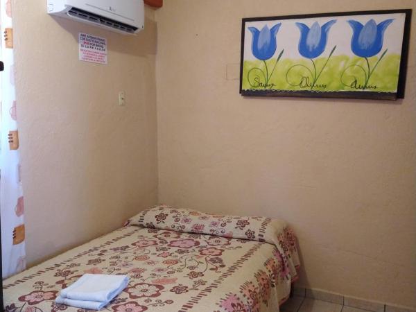 Hotel y Bungalows Olivares : photo 9 de la chambre chambre double ou lits jumeaux