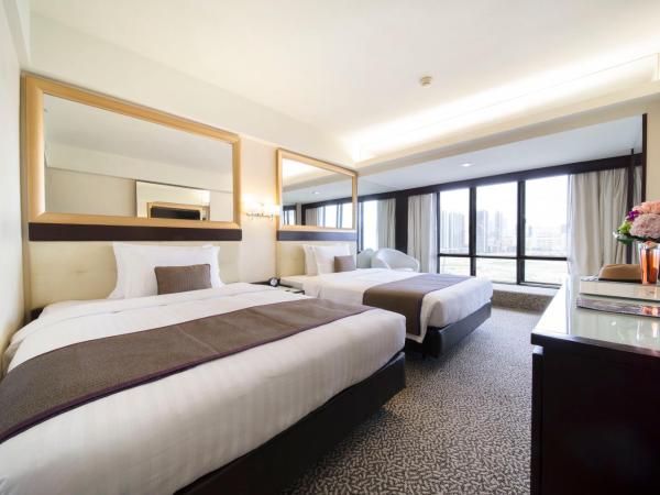 Regal Oriental Hotel : photo 1 de la chambre chambre de luxe avec 2 lits doubles