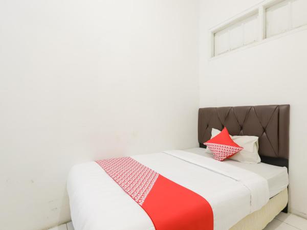 OYO 1111 Pasar Baru Inn : photo 1 de la chambre chambre simple standard