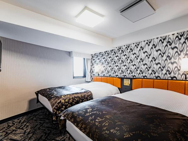 APA Hotel Sapporo Hosui Susukino Ekimae : photo 1 de la chambre chambre lits jumeaux - non-fumeurs