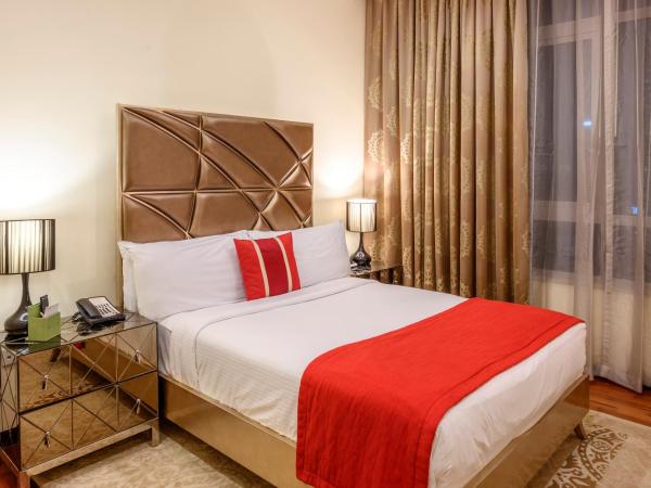 Ramada by Wyndham Downtown Dubai : photo 5 de la chambre penthouse 4 chambres, vue panoramique sur burj khalifa/fontaine, navette aéroport aller-retour gratuite de luxe