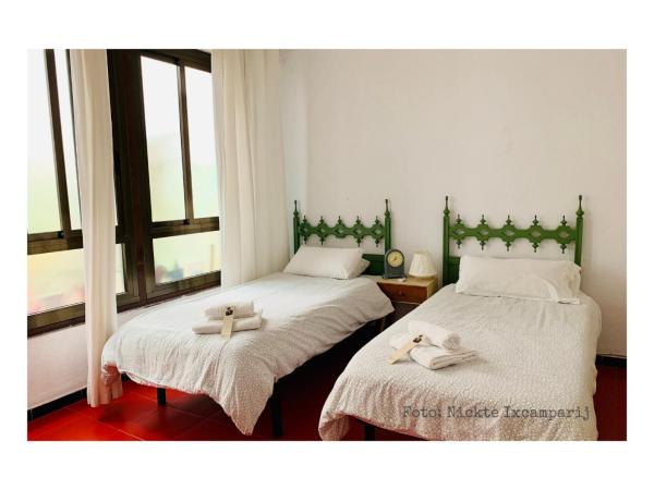 B&B Una Habitación Propia : photo 1 de la chambre chambre lits jumeaux avec salle de bains commune