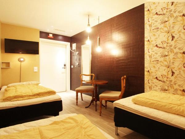 Skanstulls Boutique Hostel : photo 4 de la chambre chambre triple sans fenêtre