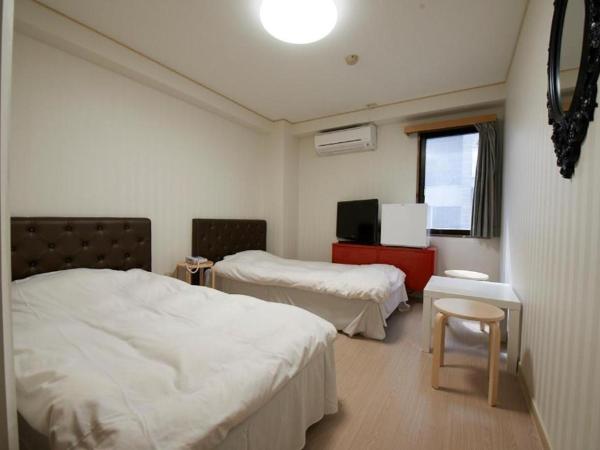 Hotel Empire in Shinjuku : photo 3 de la chambre chambre lits jumeaux