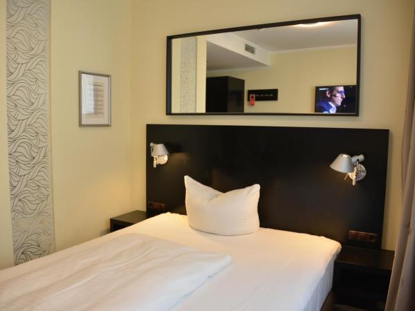 Belle Blue Zentrum : photo 3 de la chambre chambre lit queen-size