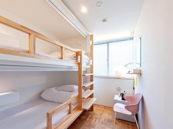 plat hostel keikyu haneda home : photo 1 de la chambre chambre lits jumeaux standard avec salle de bains commune