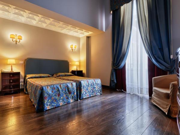 Decumani Hotel De Charme : photo 1 de la chambre chambre double/lits jumeaux confort