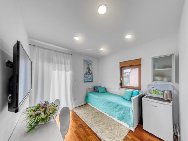 Guesthouse Residence Major : photo 4 de la chambre chambre double deluxe (2 adultes + 1 enfant)