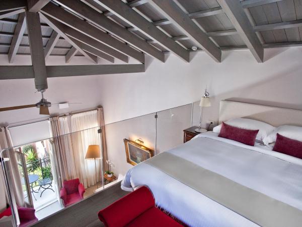 Rimondi Boutique Hotel - Small Luxury Hotels of the World : photo 1 de la chambre suite luxueuse - domaine