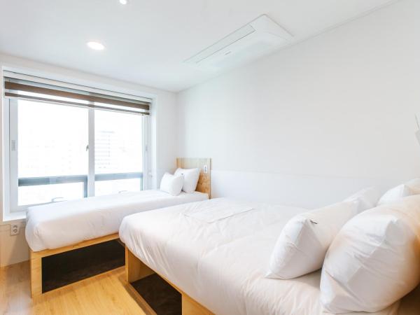 Seoulite Inn Myeongdong Formerly - Step Inn Myeongdong 2 : photo 2 de la chambre chambre triple