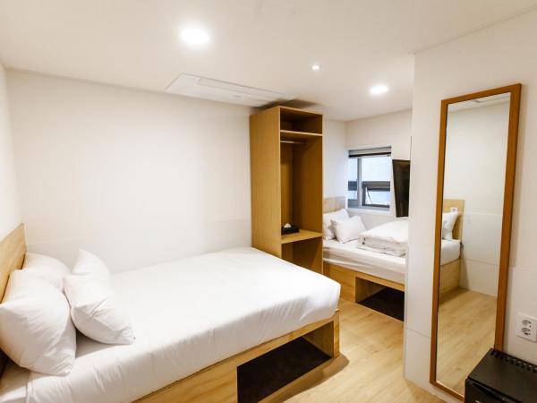 Step Inn Myeongdong 1 : photo 1 de la chambre chambre triple