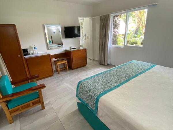 Hotel Posada Quinta Las Flores : photo 2 de la chambre suite deluxe avec baignoire spa