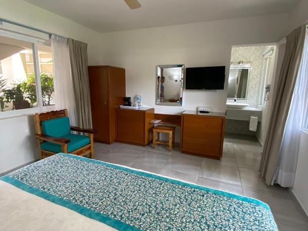 Hotel Posada Quinta Las Flores : photo 1 de la chambre suite deluxe avec baignoire spa