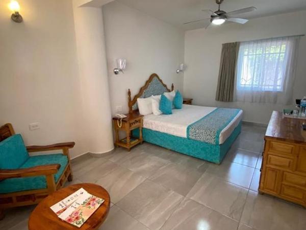 Hotel Posada Quinta Las Flores : photo 2 de la chambre suite junior deluxe