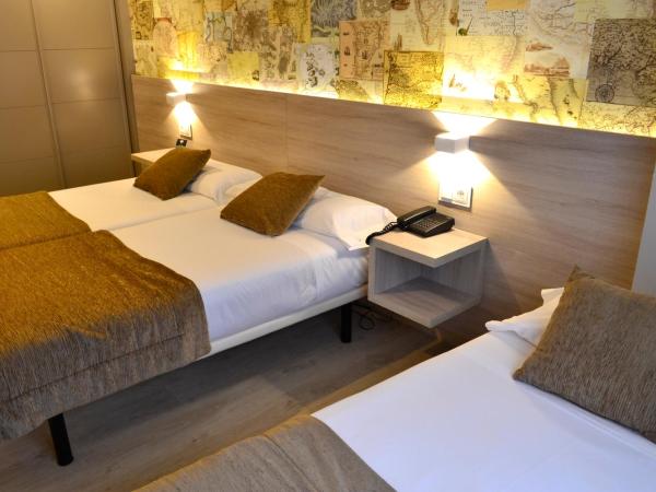 Hotel Alda San Carlos : photo 2 de la chambre chambre lits jumeaux avec lit d'appoint (3 adultes)