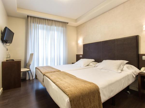 Hotel Alda San Carlos : photo 1 de la chambre chambre double ou lits jumeaux