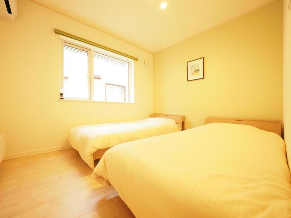 Family Tree Guest House : photo 1 de la chambre chambre lits jumeaux