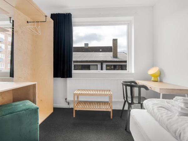 Sleepcph : photo 2 de la chambre chambre simple avec salle de bains commune