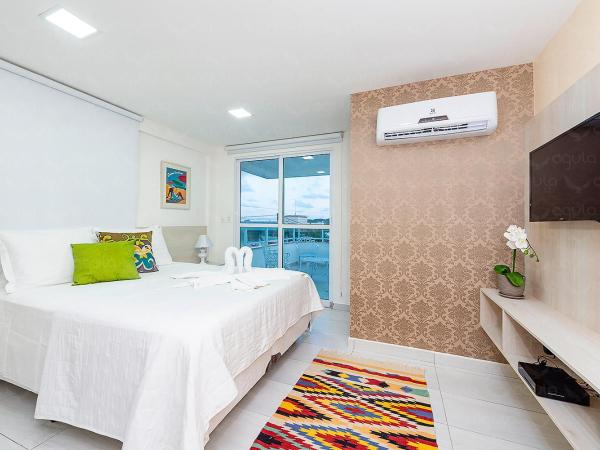 Águia Flats Pousada : photo 1 de la chambre chambre double avec patio