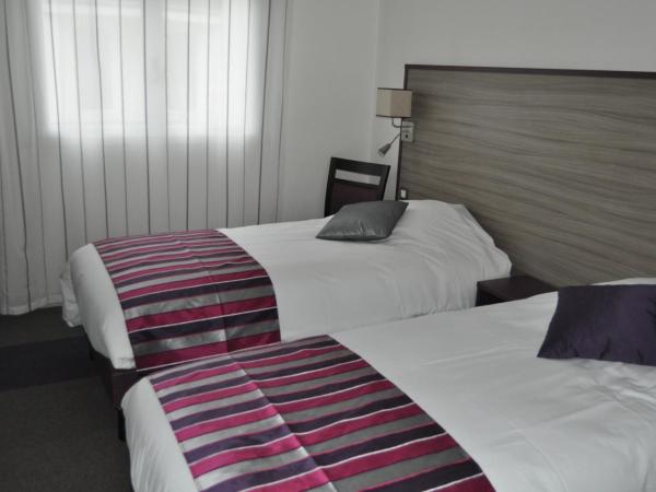 Hôtel O'Nice Saintes : photo 5 de la chambre chambre lits jumeaux