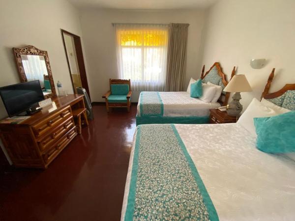 Hotel Posada Quinta Las Flores : photo 2 de la chambre chambre double standard