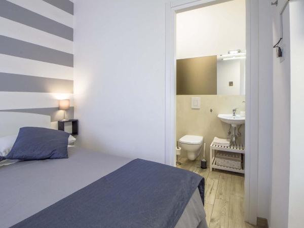 Le Dimore in Centro con Parcheggio e Self check-in : photo 6 de la chambre appartement 2 chambres avec 2 salles de bains