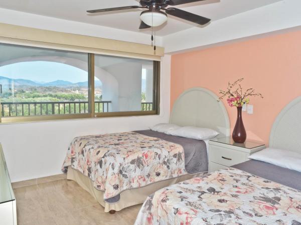 ENNA INN IXTAPA DEPARTAMENTOS ViSTA AL MAR : photo 3 de la chambre appartement supérieur